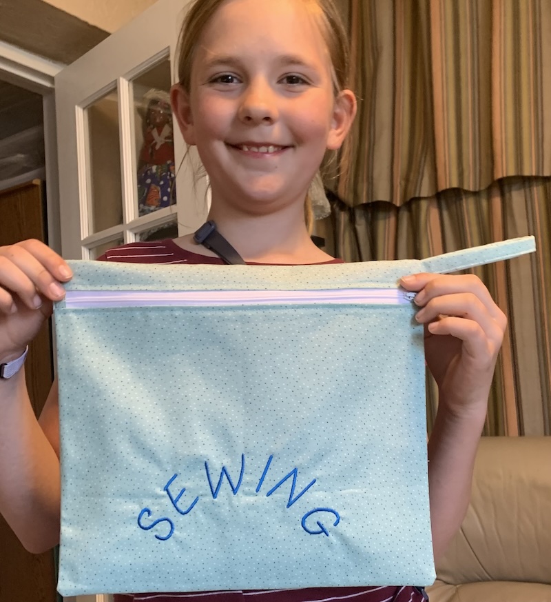 Student working on sewing project